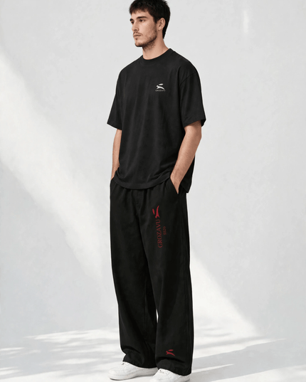 Three-quarter view of the SS26 wide-leg pants in 300 g/m² cotton stretch
