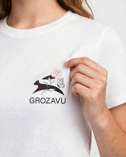 Logo close-up on the White straight-cut cotton tee
