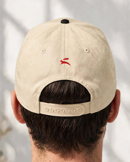 Close-up of the adjustable snap closure on the structured cap