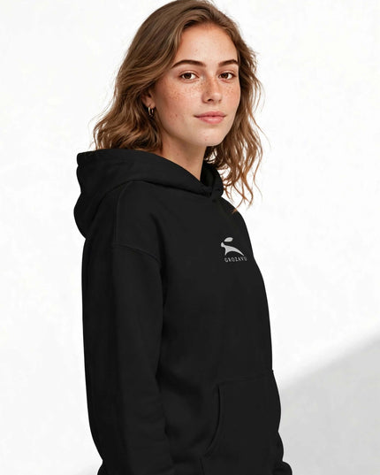 Woman wearing the black suede-finish hoodie with kangaroo pocket