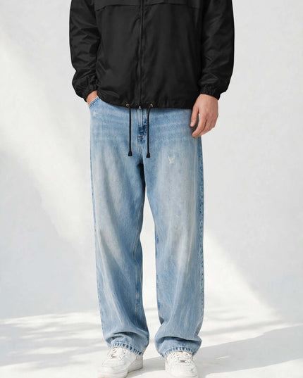 Elasticated hem and cuff detail on the black windbreaker jacket