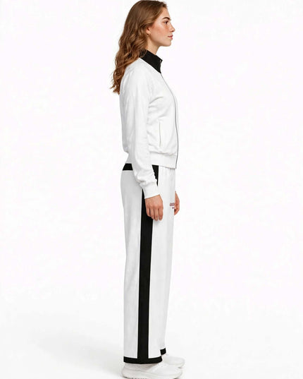 Side profile showing the straight open leg of the wide-leg pants