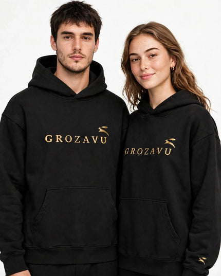 Two models in the black 280 g/m² organic cotton kangaroo hoodie