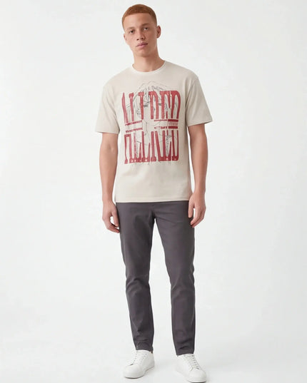 Maison Grozavu Timeless Sable Tee in signature tone — front view showing the clean back yoke detail