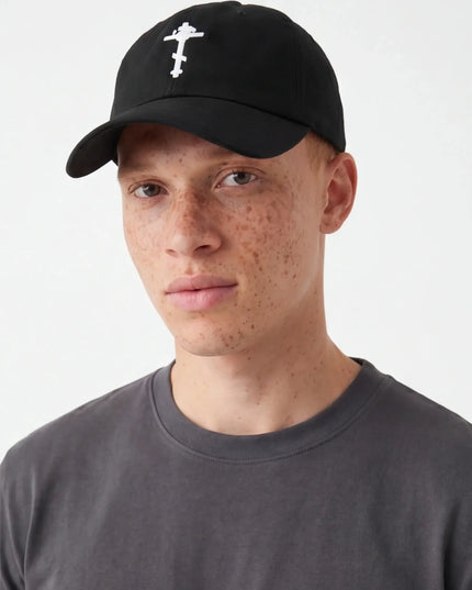 Front view of the Maison Grozavu Bone Cap Profile in hat — showing the robust construction.