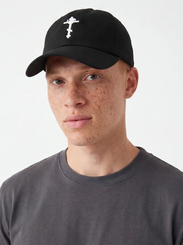 Front view of the Maison Grozavu Bone Cap Profile in hat — showing the robust construction.