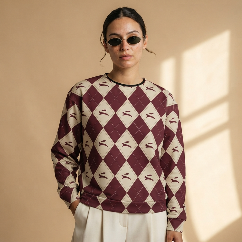 Model wearing the Hare Argyle Sweatshirt in Bordeaux, front view