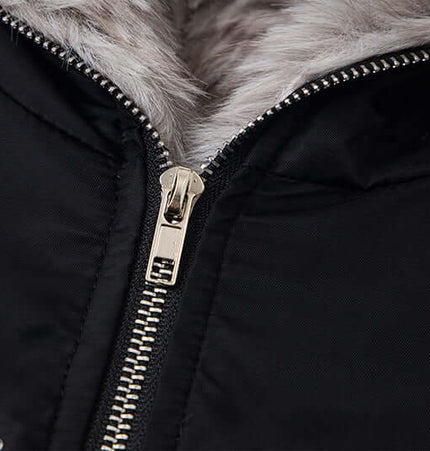 Close-up of the zipper and faux fur lining of the Hawk Embroidered Letter Hooded Coat.