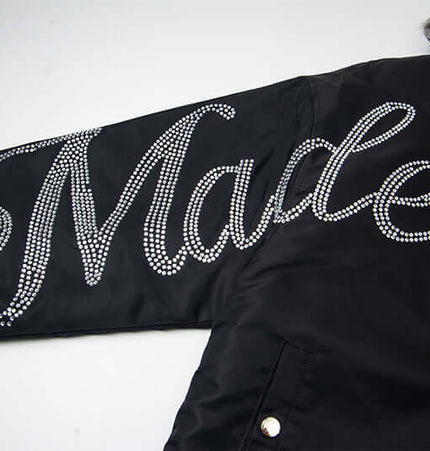 Hawk Embroidered Letter Hooded Coat showcasing intricate rhinestone detailing on the sleeve.