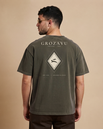 Heritage Diamond Tee in washed charcoal on a model, back view with the GROZAVU Heritage print
