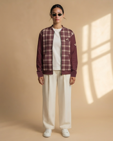 Heritage Tartan Bomber in Bordeaux styled with cream trousers and white sneakers, full-length studio shot