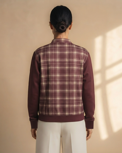 Heritage Tartan Bomber in Bordeaux on a model, back view with the tartan back and solid bordeaux sleeves