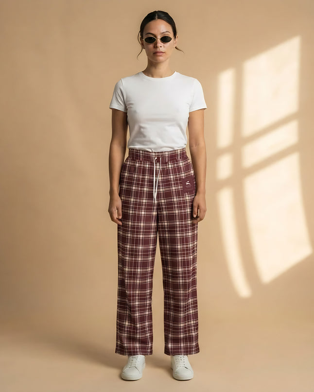 Model wearing the Heritage Tartan Wide-Leg Joggers in Bordeaux, full-length front view