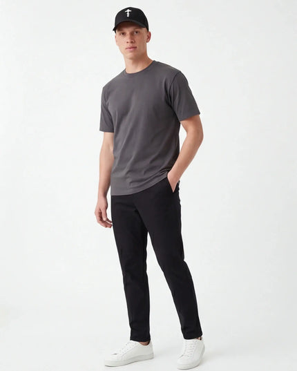 Front view of the Maison Grozavu Bone Cap Profile in hat — showing the sleek silhouette.