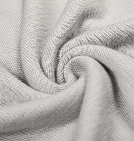 High Neck Street Knit Sweater – Loose Fit fabric close-up showing soft, blended synthetic fiber texture.