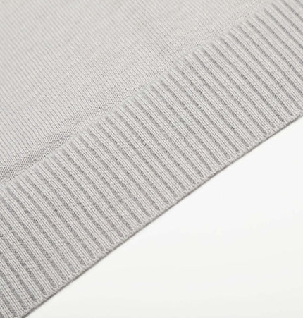 High Neck Street Knit Sweater – Loose Fit close-up of ribbed hem detail