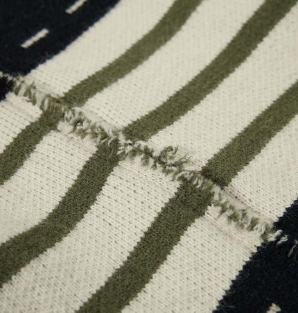 Texture detail of High Neck Stripe Jacquard Cardigan showcasing the jacquard knit design and cozy fabric.