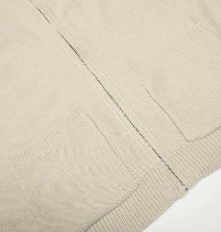 Knit Zipper Sweater Jacket – High Neck in beige with pockets and open-front design.