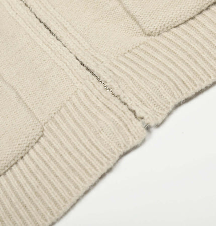 Close-up view of the Knit Zipper Sweater Jacket – High Neck showcasing the soft acrylic blend fabric and jacquard knit pattern.
