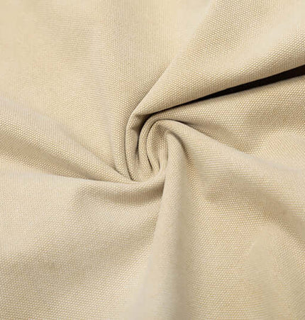 Close-up of beige fabric showcasing texture and weave, suitable for apparel like Elastic Waist Denim Shorts – Straight Fit.