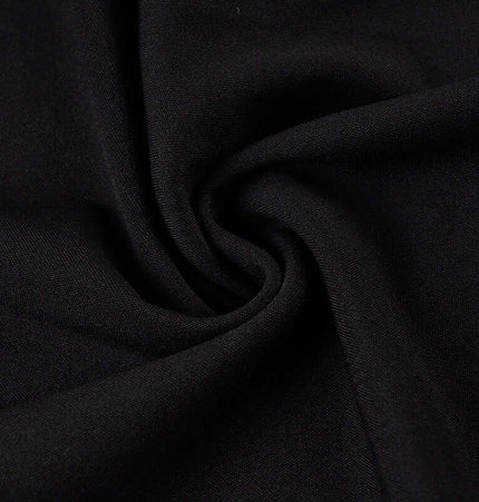 Fabric detail of the Low-Waist Flared Leggings – Slim Fit, showcasing high-quality twill polyester in black.