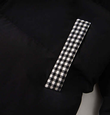 Hooded Cotton Puffer Coat – Loose Fit detail showing checkered pocket on black fabric