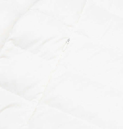 Hooded Quilted Down Jacket fabric close-up showcasing quilted texture and zipper detail.