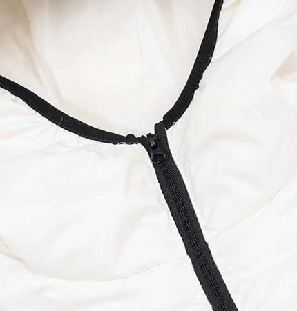 Close-up of the hood and zipper of a Hooded Quilted Down Jacket, showcasing its stylish design and warm features.