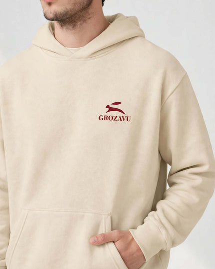 Chest detail on the beige 340 g/m² mill-dyed hoodie