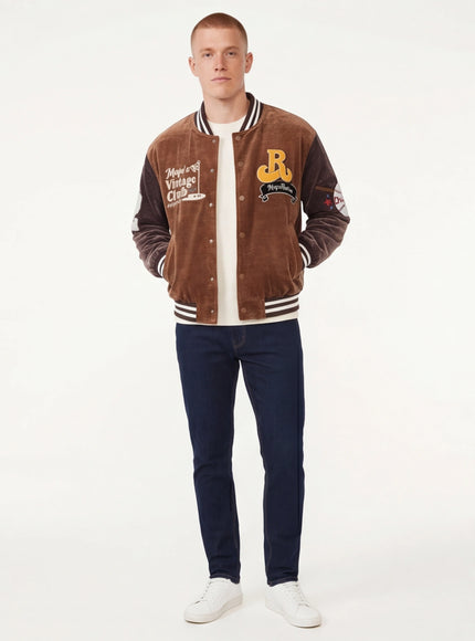Model wearing Brown baseball jacket , heavy coat by Grozavu