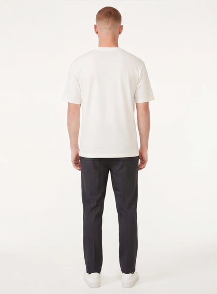 Close-up of Black applique badge graphic tee fabric