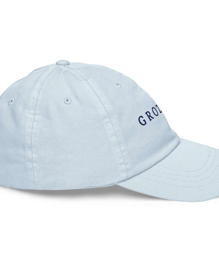 Front view of the Maison Grozavu Pure Slate Cap in cap — showing the premium fabric texture.