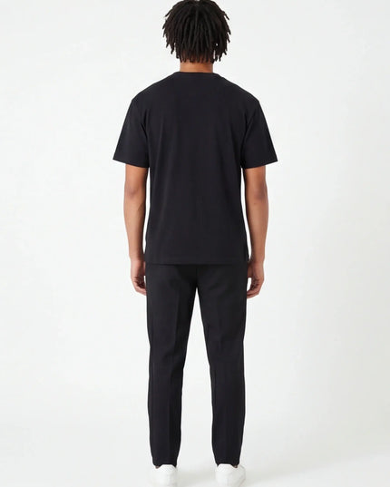 Maison Grozavu Modern Obsidian Tee in signature tone — rear view showing the tailored side seam