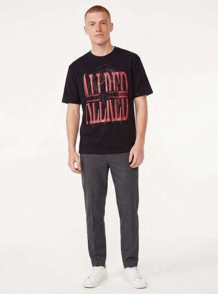 Model wearing Black bubble letter print short top by Grozavu