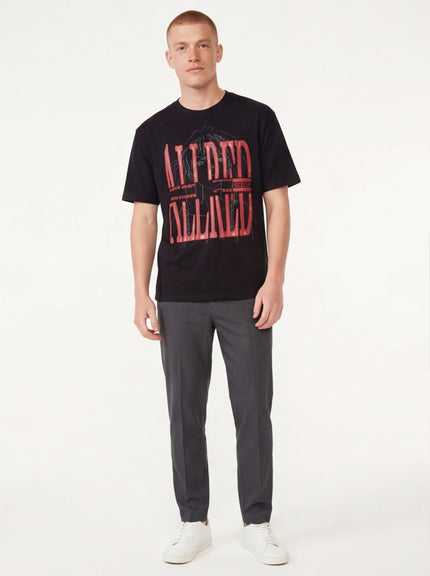 Model wearing Black bubble letter print short top by Grozavu