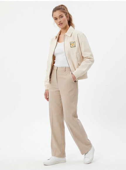 Model wearing Apricot cropped tailored jacket by Grozavu