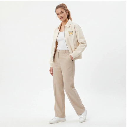 Model wearing Apricot cropped tailored jacket by Grozavu