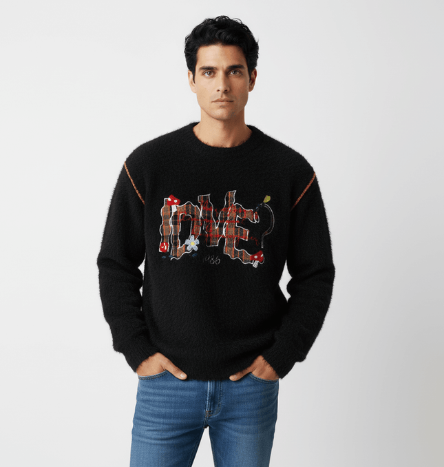 Knit Sweater with Letter Applique styled on model, featuring hand-stitched design and relaxed fit for autumn layering.