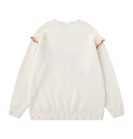 Knit Sweater with Letter Applique, back view showing soft white fabric and orange ruffle detailing.
