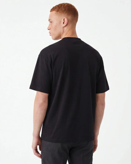 Front view of the Maison Grozavu Pure Carbon Tee in shirt — showing the sophisticated hardware.