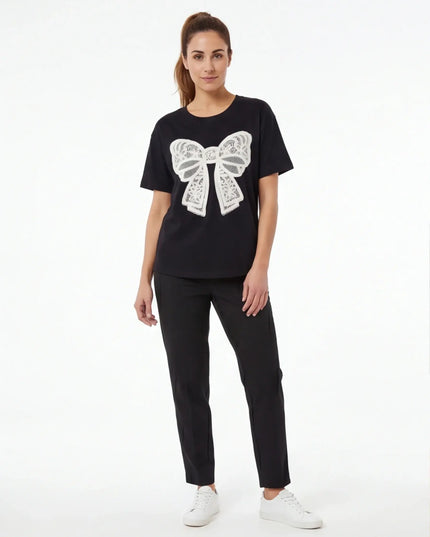 Basalt Tee Structure lifestyle image — the piece worn in context showing natural drape and proportions
