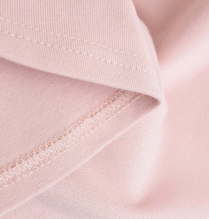 Detail of soft cotton fabric showing stitching for Camisole Style Layered Tank Top.