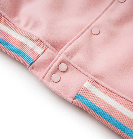 Close-up of the Letter Embroidery Colorblock Jacket showcasing pink fabric and striped ribbed cuffs.