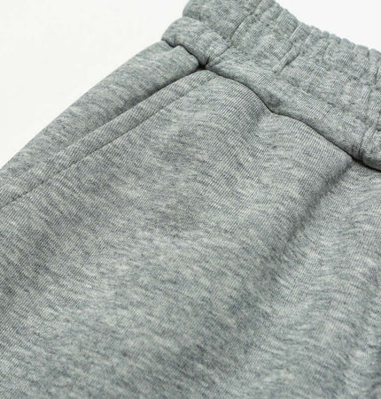 Letter Print Casual Pants – Loose Fit close-up showing elastic waistband and soft fabric texture.