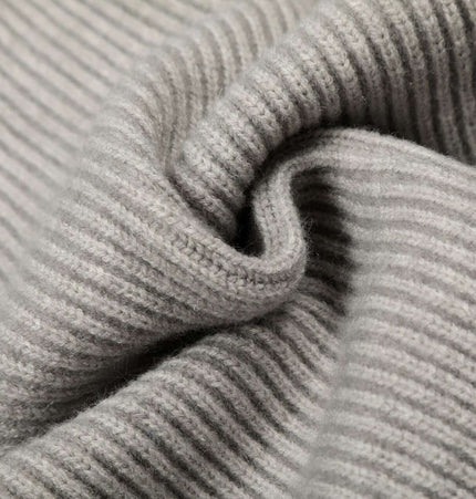 Close-up of soft fabric showing the texture of the Retro Cardigan Sweater - Loose Fit.