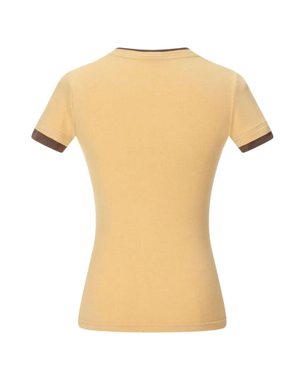 Maison Grozavu Ghost Tee Silhouette — rear view showing the back panel construction and neutral colourway hemline detail