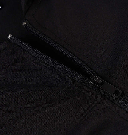 Close-up view of the zipper on the Long Sleeve Devil Hooded VNeck TShirt, showcasing its sleek black fabric and design.