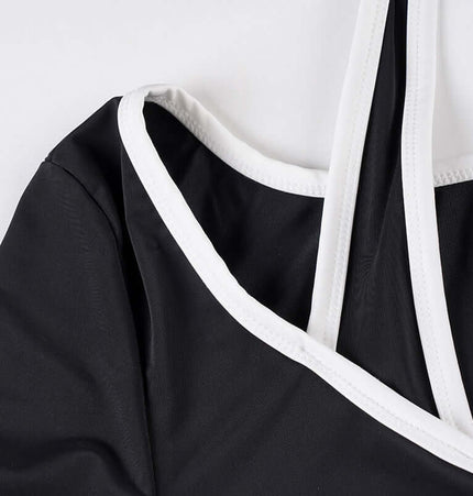 Close-up of the Long Sleeve Halter Neck Contrast Top highlighting the halter neckline and contrast trim details.