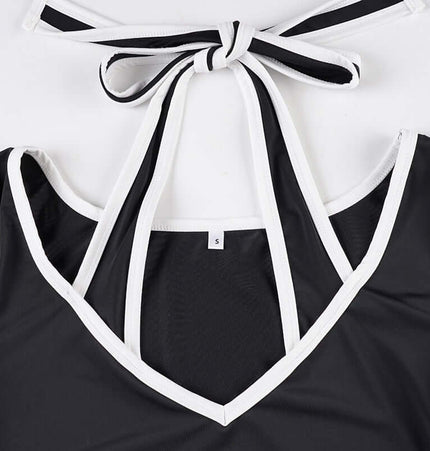 Long Sleeve Halter Neck Contrast Top featuring a unique halter neckline with contrasting details.