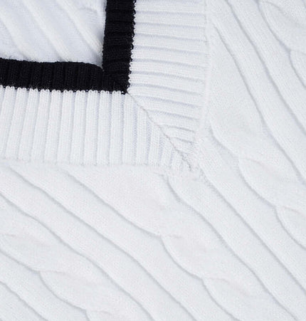 Close-up of the Long Sleeve VNeck Knit Top showcasing the textured knit and V-neckline detailing.